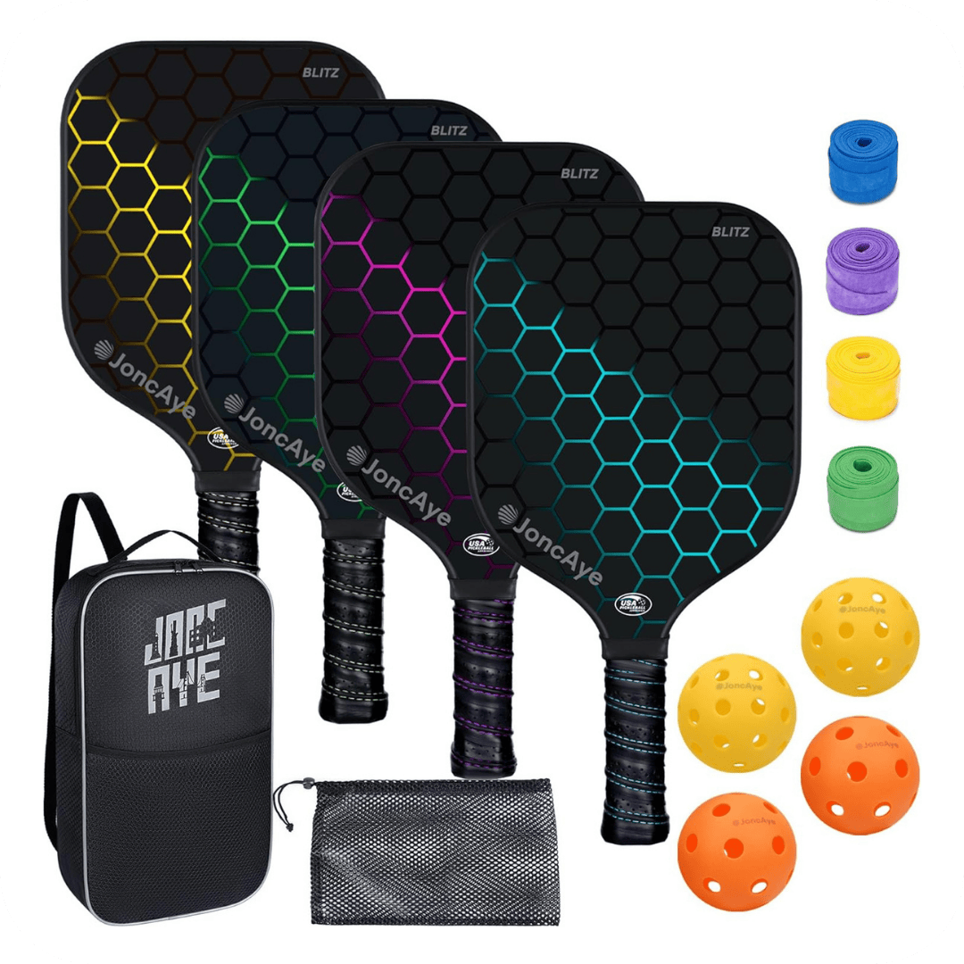 Four pickleball paddles with colorful hexagon patterns, four sets of grip tape, four balls (yellow and orange), a black carrying bag, and a mesh bag for accessories displayed on a white background.